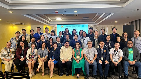 KWF chairman Dr. Arthur P. Casanova (seated, center) and UST SSAS chief Dr. Wennielyn Fajilan (seated, fourth from left) with fellow translators and educators.