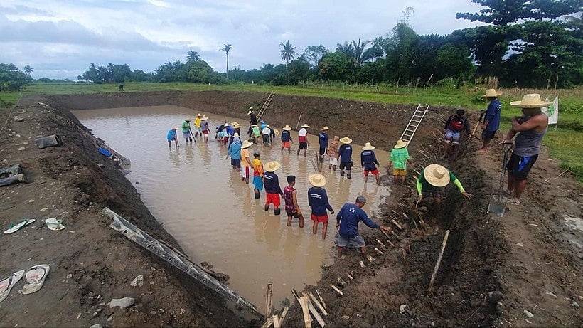 Projects LAWA, BINHI beneficiaries build water harvesting system in Quezon town - Vimarsana News
