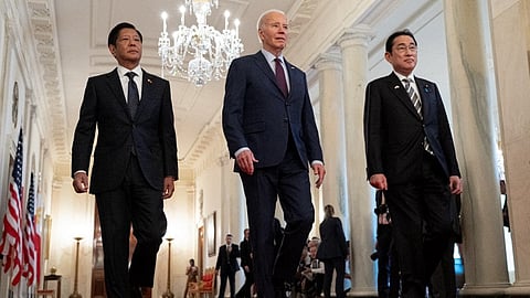 U.S. President Joe Biden arrives for a trilateral meeting with Japanese Prime Minister Fumio Kishida (R) and Filipino President Ferdinand Marcos (L) at the White House on 11 April 2024 in Washington, DC. 