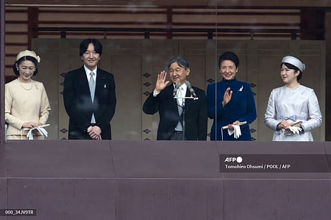 Japan's Emperor Naruhito (C) and Empress Masako (2-R) wave to well-wishers as Crown Princess Kiko (L), Crown Prince Akishino (2-L) and Princess Aiko (R) look on on the balcony of the Imperial Palace in Tokyo on 23 February 2024. Emperor Naruhito celebrated his 64th birthday.
