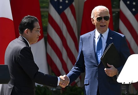 US President Joe Biden and Japanese Prime Minister Fumio Kishida shake hands after a joint press conference in the Rose Garden of the White House in Washington, DC, April 10, 2024.

