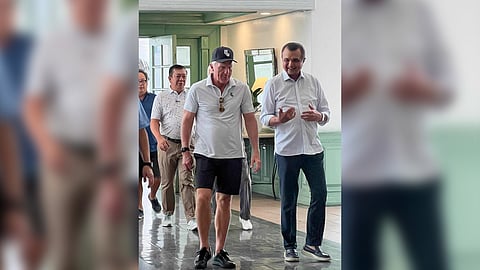 LIV Golf chief executive officer Greg Norman (left) gets a warm welcome from Manila Southwoods chairman Robert John Sobrepeña during his visit on Tuesday. 
