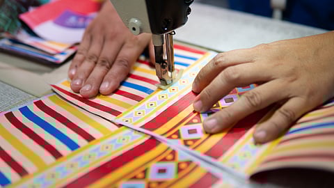 TOTES come in summer’s bold brights, coolest stripes and matching pouches in modern prints.