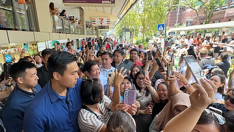 Surprising OFWs in Singapore Euphoric overseas Filipino workers take selfies with President Ferdinand R. Marcos Jr., who made a surprise visit at Lucky Plaza in Singapore on Sunday to express gratitude for their unwavering love and support. Marcos Jr. said his visit to kababayans completes his work trip to address the 10th Asian Conference. | PHOTOGRAPH COURTESY OF BONGBONG MARCOS FB PAGE