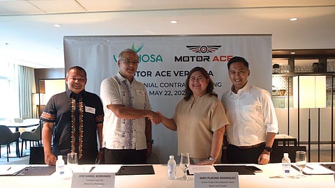 Motor Ace Philippines chief executive officer and president Jose Borromeo (second from left) and Ayala Land Estates Inc. senior project development head Mayi Platero Rodriguez (second from right) formalize a deal that will lead to the construction of a motorcycle hub in Vermosa. Also shown are Motor Ace Philippines chief finance officer Maxcy Borromeo (left) and Vermosa project development manager Moses John Aragones (right).