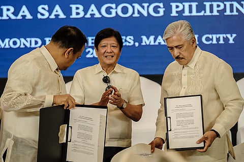 Politics is addition President Ferdinand ‘Bongbong’ Marcos Jr. (center) witnesses the signing of the alliance between the Partido Federal ng Pilipinas represented by its president South Cotabato Governor Reynaldo Tamayo Jr. (left) and the Nationalist People’s Coalition headed by former Senate President Vicente Sotto III.