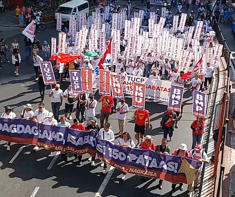 LABOR DAY RALLY. Several groups hold protests across the country on Wednesday, Labor Day, to air their grievances. A group was spotted chanting along España in Manila.