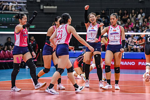 Defending champion Creamline celebrates its 25-16, 25-21, 25-20 win over Chery Tiggo in the PVL All-Filipino Conference semifinal round Sunday at the Smart Araneta Coliseum.