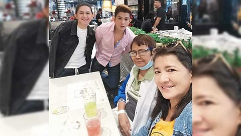 Like every family Adoracion ‘Auntie Inday’ Relox (3rd from left) relaxes with long-time partner Carol (right) and her two sons, Christian (left) and Christopher (2nd from left).