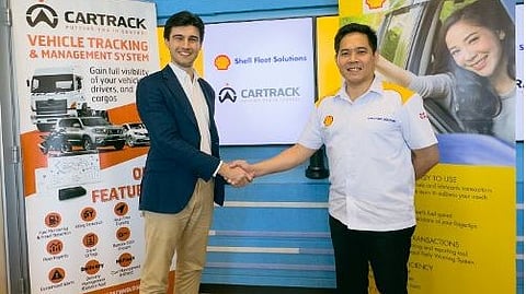 Rogerio Calisto, Asia regional manager for Cartrack and Chris Alli, head of Shell Fleet Solutions for the Philippines, seal the deal.