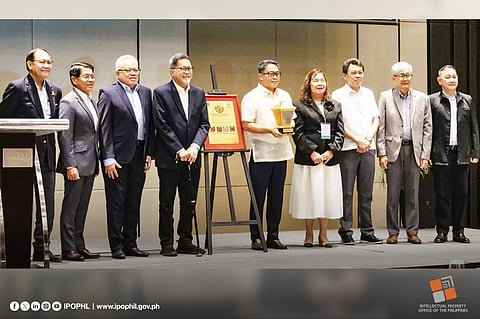 At the awarding ceremony are (from left) Intellectual Property Association of the Philippines president Rico Domingo; former Customs Commissioner Gen. Rey Leonardo Guerrero; former Trade Secretary Ramon Lopez; Institute for Solidarity in Asia panel chairperson Bill Luz; IPOPHL director general Rowel Barba; deputy director generals Anne Claire Cabochan and Nathaniel Arevalo; former Department of Information and Communications Technology Undersecretary Monchito Ibrahim, and Philippine National Police-Center for Police Strategy Management director Brig. Gen. Victor Arevalo.