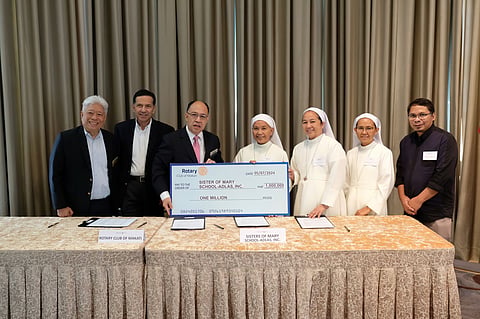 Memorandum of agreement and handing over to the Sisters of Mercy a symbolic cheque for P1 million representing RC Makati's donation to the religious congregation on 7 May 2024 at The Peninsula Manila. In photo are, from left: former RC Makati PP Charlie Rufino, Director Rodrigo Segura, RC Makati VP Howie Calleja, and representatives from the Sisters of Mary School-Adlas Incorporated. 