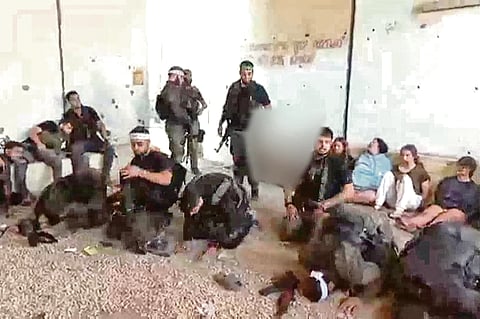 FIVE Israeli female soldiers (right) are held captive by Palestinian Hamas terrorists during the 7 October 2023 attack on Israel. 