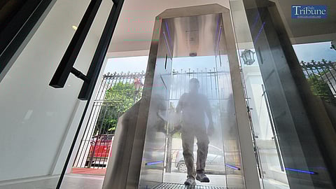 TRIBUNE-coviddisinfectiondoor