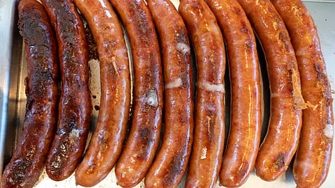 Grilled sausages are pictured at the city's oldest sausage stand 'Wuerstelstand LEO' in Vienna, Austria on 18 June 2024.