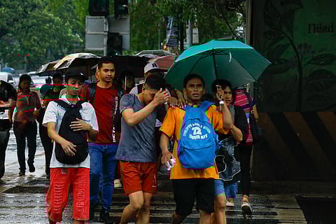Motorists and pedestrians experienced heavy rain along UN Avenue in Manila on 21 June 2024. PAGASA said that some parts of Luzon may experience heavy rainfall due to localized thunderstorms.