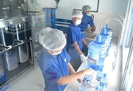 DENR seeks closer regulation of water refilling stations