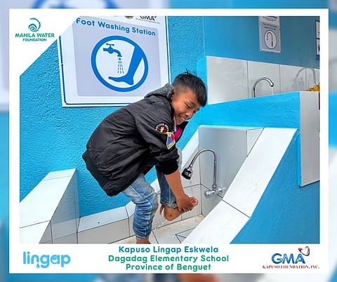 STUDENT tries the foot washing station in Dagadag Elementary School in Benguet. 