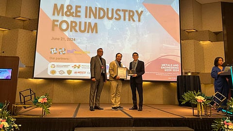 DOST-MIRDC executive director Robert Dizon (rightmost) hands over a plaque of appreciation to DoTr Undersecretary for railways Jeremy Regino (middle), for giving the keynote speech during the Metals and Engineering Week Industry Forum. Looking on is DoST MIRDC deputy executive director for technical services Jonathan Puerto.