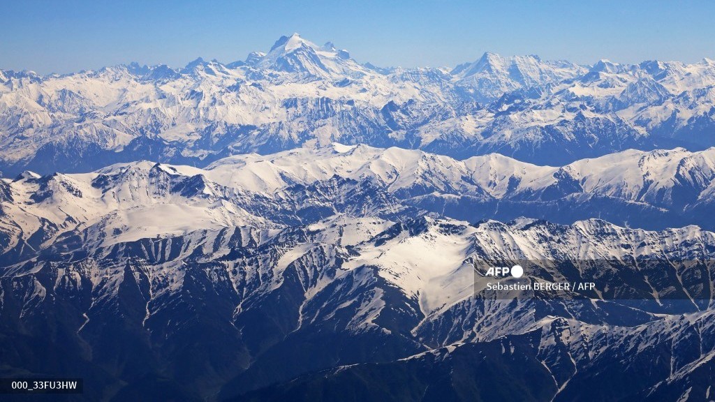 (FILES) The Indian Himalayas are seen from a flight to Srinagar on 22 May 2023. India is hosting a G20 tourism working group meeting under high security in Srinagar, the capital of the disputed region of Kashmir, which has been the location of a decades-long insurgency.