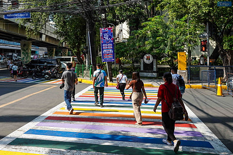 Pedestrians cross