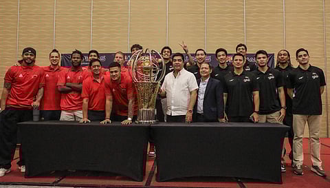 PBA commissioner Willie Marcial (middle) presents the players of San Miguel Beer and Meralco who will clash in the Philippine Cup best-of-seven finals series starting Wednesday.    