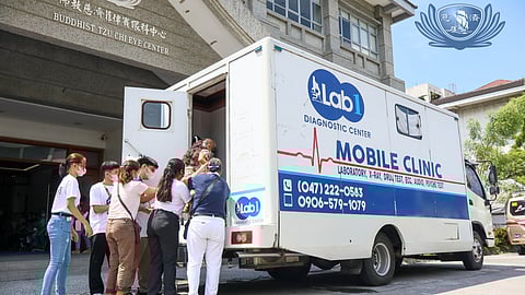 PATIENT is assisted to the Lab1 mobile lab at the Tzu Chi Eye Center in Sta. Mesa, Manila.