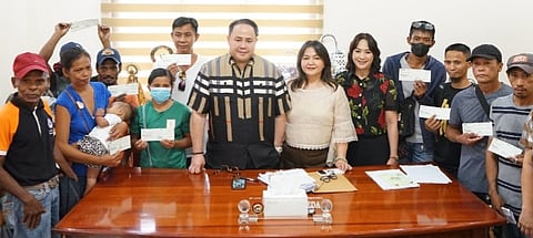 GOVERNOR Dennis ‘Delta’ Pineda, former board member Mylyn Pineda-Cayabyab, Special Assistant to the Governor and PDRRM chief Angelina Blanco, and Acting PSWDO Fe Manarang lead the distribution of financial assistance to 13 fire-hit families recently.
