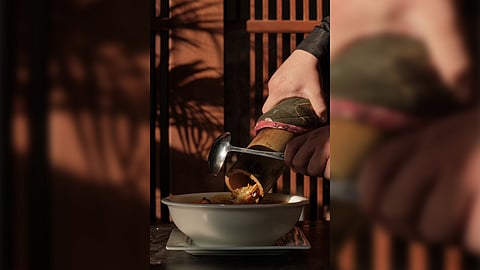 Binulo, a traditional method of cooking in bamboo.