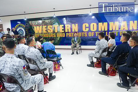 President Ferdinand Romualdez Marcos Jr. visits the 80 uniformed personnel and their families who conducted the Philippine rotation and resupply (RORE) mission to Ayungin Shoal, including Seaman First Class Jeffrey Facundo of the Philippine Navy, who lost his right thumb during a maritime clash with China last June 17 at the Western Command in Puerto Princesa, Palawan, on June 23, 2024. During the Talk to Troops visit, the president also awarded the Order of Lapu-Lapu Kamagi Medal to the 79 soldiers involved in the RORE mission, while Seaman First Class Facundo received the Order of Lapu-Lapu Kampilan Medal. Photo by Yummie Dingding/PPA POOL