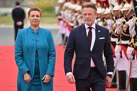 Denmark's Prime Minister Mette Frederiksen and her husband Bo Tengberg arrive to attend the International commemorative ceremony at Omaha Beach marking the 80th anniversary of the World War II "D-Day" Allied landings in Normandy, in Saint-Laurent-sur-Mer, in northwestern France, on June 6, 2024. The D-Day ceremonies on June 6 this year mark the 80th anniversary since the launch of 'Operation Overlord', a vast military operation by Allied forces in Normandy, which turned the tide of World War II, eventually leading to the liberation of occupied France and the end of the war against Nazi Germany.