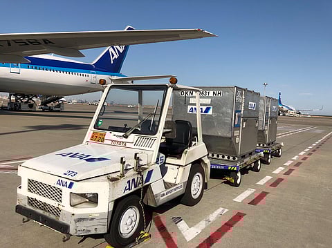 DRIVERLESS tow tractor of ANA and Toyota Industries at the Haneda Airport