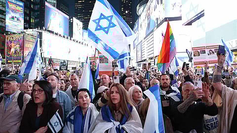 Thousands attend a "Bring Them Home" rally hosted by Israeli-American Council in Times Square, in the heart of New York City, in support of as many as 200 Israeli hostages being held captive by Hamas in the Gaza Strip, Oct. 19, 2023. 