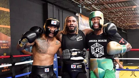 Eumir Marcial (left) receives quality work from American sparmates Jarret Hurd and Amir Anderson in Washington, D.C. just before he reunites with the national team in France. 