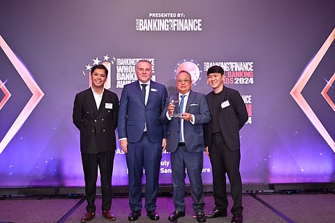 Lending firm Asialink Finance Corp won the SME Financial Inclusion Initiative of the Year award at the ABF Retail Banking Awards 2024. Receiving the plum are (from left) Val Paolo Origenes, Asialink’s marketing and communications manager; Tim Charlton, CEO of Charlton Media Group; Ruben Y. Lugtu II, Asialink’s chairman; and Gabriel Doromal, Asialink’s digital marketing officer.