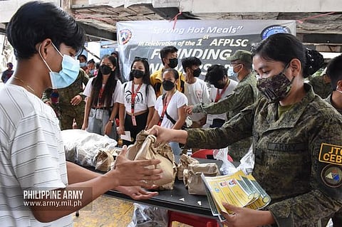 Troops support typhoon victims
