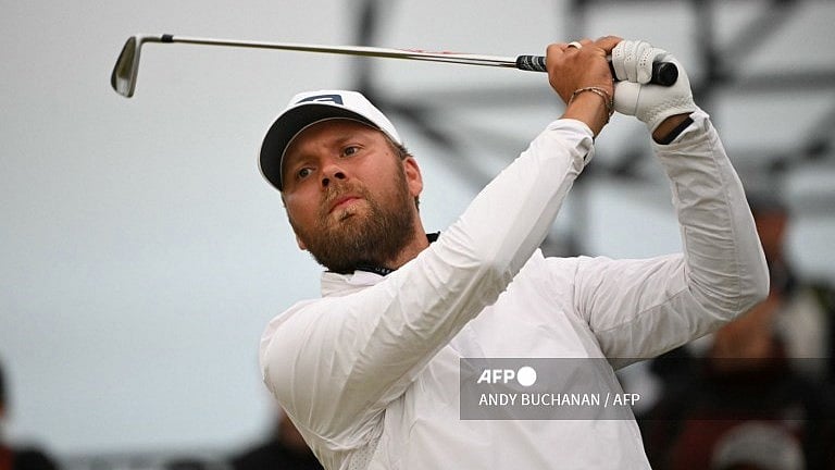 Brown takes shock British Open lead as McIlroy, Woods suffer nightmare