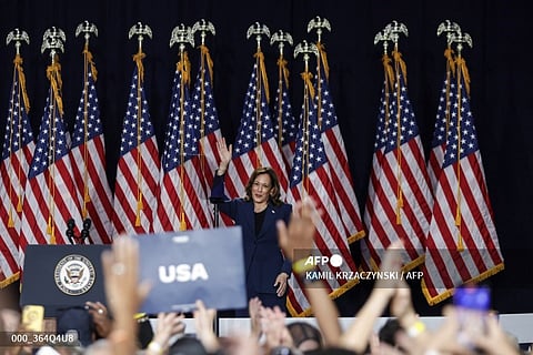 US Vice President and Democratic Presidential candidate Kamala Harris waves to the crowd after speaking at West Allis Central High School during her first campaign rally in Milwaukee, Wisconsin, on July 23, 2024. Harris is in Wisconsin to start her presidential campaign after effectively clinching the Democratic presidential nomination.
