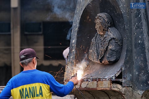 Personnel from the Manila Local Government's City Engineering Office are seen restoring a historical monument to Dr. Maria Paz Mendoza-Guazon, who was regarded as a woman of many firsts, which has already been dilapidated and vandalized along the center island area where the NLEX-SLEX connector project in Pandacan is located, on Monday, 15 July 2024. During the construction of the NLEX-SLEX link project, the location of the monument was temporarily restricted to the public, but by the time it was finished, the said monument had already deteriorated and was no longer worth seeing. Dr. Maria Paz Mendoza-Guazon was the first woman to graduate from UP College of Medicine, as well as the founder of the National League of Filipino Women and the first woman to serve on the University of the Philippines' Board of Regents. She was also the first Filipina to receive the Zobel Prize in 1930 for her work "Notas de Viaje"; the founder and first president of the Philippine Association of University Women; and the first managing editor of its official journal, The Woman's World. 