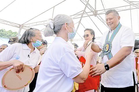 Elderly PDLs freed Justice Secretary Jesus Crispin Remulla hands the release papers and send-off gifts to elderly women prior to their release in April 2023. In all, 580 inmates were released at that time.