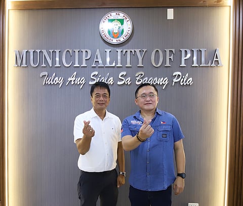 Pila, Laguna Mayor Edgardo Ramos (left) and Senator Christopher "Bong" Go
