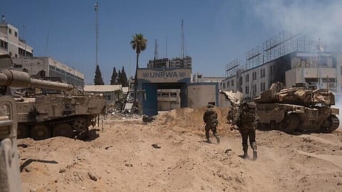 Troops of the Commando Brigade operate at UNRWA's headquarters in Gaza City.