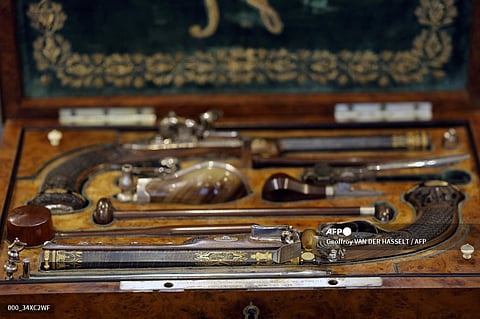 This photograph shows a box with two pistols, which belonged to Emperor Napoleon I, during the preview before their auction, in Paris on June 18, 2024. The sale «L’Empire à Fontainebleau», organised by both Rossini and Osenat auction houses, will take place on July 7, 2024 in Fontainebleau.