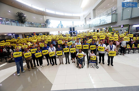 (July 08 2024)………Vice Mayor Gian Sotto of Quezon City, Atty. Franklin Quijano, Chairman of the NCSC, Glenda Relova, Executive Director of the NCDA, and Atty. Romando Artes, MMDA Chairman, Ana Marie Rafael, DSWD Asec, and Dr. Nathaniel Servando, Administrator, PAGASA, along with an estimated 600 senior citizens and persons with disabilities (PWDs), hold out 'go bags' as they participate in the Emergency Preparedness Forum at the SM City Fairview in Quezon City on Monday, July 8, 2024.……..Photo/Analy Labor
