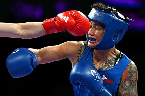 HERGIE Bacyadan makes an early exit after losing to of Li Qian of China in the Round of 16 of the women’s 75-kilogram boxing match of the Paris Olympics on Tuesday at the North Paris Arena.