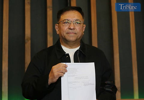 LOOK: PCSO General Manager Mel Robles shows a copy of the defamation and invasion of privacy complaint document he filed against vlogger Maharlika before the Central District Court of California in America during a press conference held in Quezon City on Sunday, 4 August 2024.