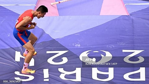 Philippines' Ernest John Obiena reacts as he competes in the men's pole vault qualification of the athletics event at the Paris 2024 Olympic Games at Stade de France in Saint-Denis, north of Paris, on August 3, 2024.