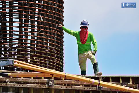 LOOK: A construction crew carefully works to connect the SLEX and NLEX roads at the Anonas site in Sta. Mesa, Manila, on Sunday, 4 August 2024. | Via King Rodriguez