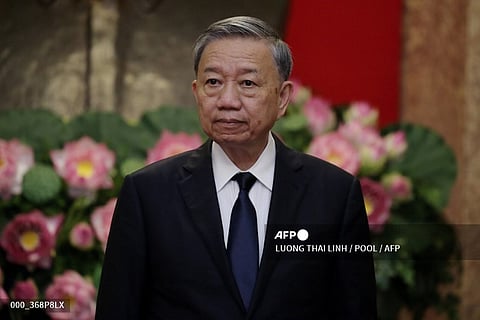 (FILES) Vietnam's President To Lam waits for the arrival of Japan's former prime minister Yoshihide Suga at the Presidential Palace in Hanoi on July 25, 2024. Vietnam's Communist Party named President To Lam as the country's top leader on August 3, after the death of his predecessor two weeks ago.

