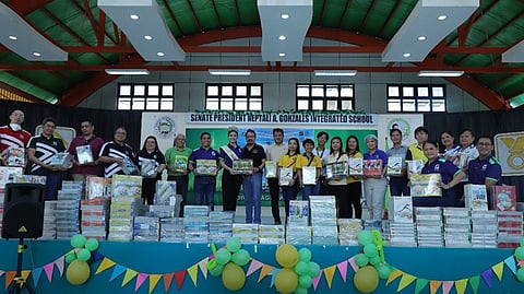 SM Foundation, Phoenix Publishing House, PICPA, along with its partners for social good, turnover books for the students of Senate President Neptali A. Gonzales Integrated School (SPNAGIS), Mandaluyong City ahead of the school opening. Accepting the books on behalf of SPNAGIS is Principal Remilio Pascual (sixth from left).